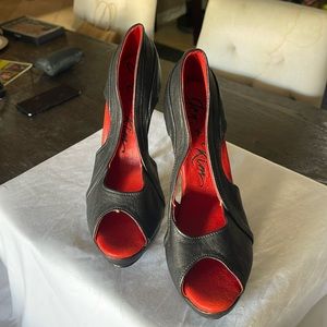 Black leather heels by Jen and Kim have never been worn